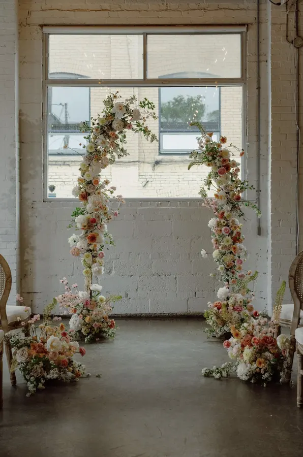 Jessie & Anthony wedding florals at Propellor Coffee by Mythology Floral Art, Toronto, photograph by Inna Yasinska