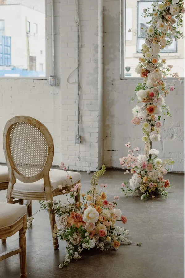 Jessie & Anthony wedding florals at Propellor Coffee by Mythology Floral Art, Toronto, photograph by Inna Yasinska