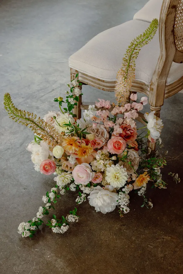 Jessie & Anthony wedding florals at Propellor Coffee by Mythology Floral Art, Toronto, photograph by Inna Yasinska
