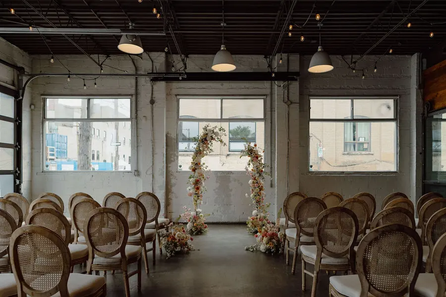 Jessie & Anthony wedding florals at Propellor Coffee by Mythology Floral Art, Toronto, photograph by Inna Yasinska