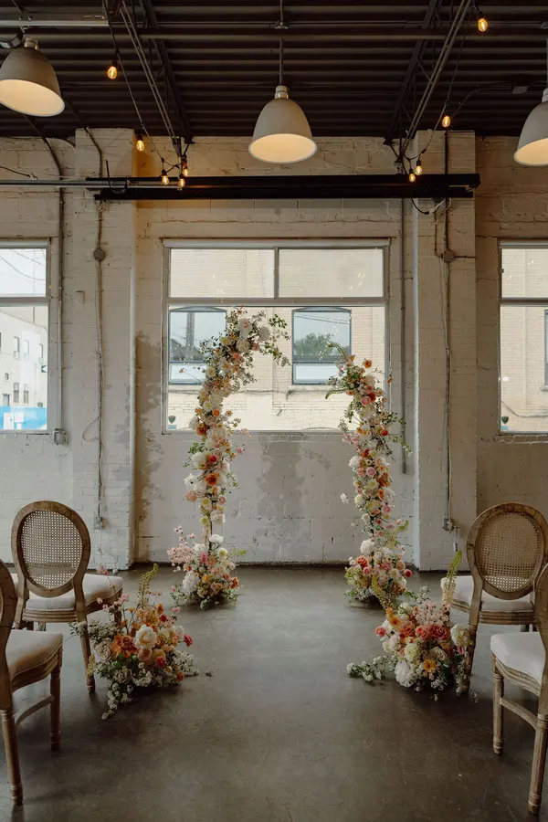 Jessie & Anthony wedding florals at Propellor Coffee by Mythology Floral Art, Toronto, photograph by Inna Yasinska
