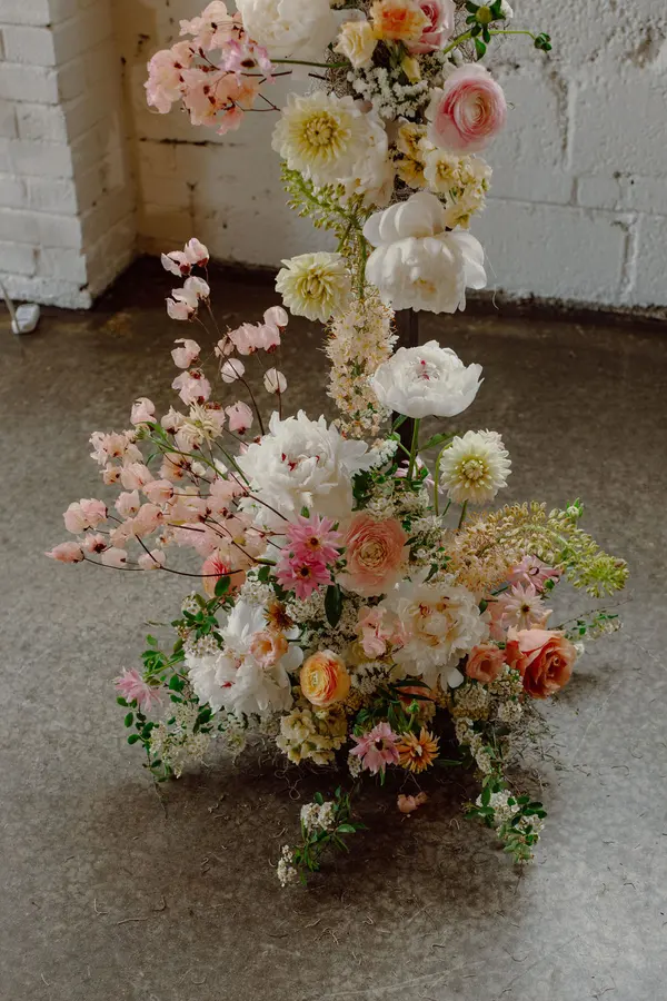 Jessie & Anthony wedding florals at Propellor Coffee by Mythology Floral Art, Toronto, photograph by Inna Yasinska
