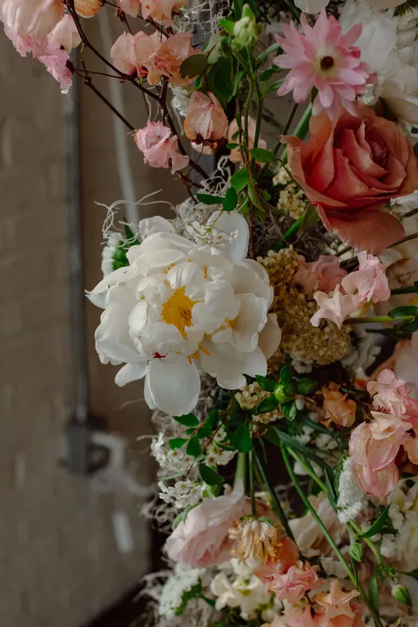 Jessie & Anthony wedding florals at Propellor Coffee by Mythology Floral Art, Toronto, photograph by Inna Yasinska